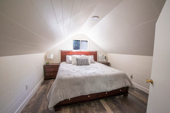 King sized bed upstairs in the main house 