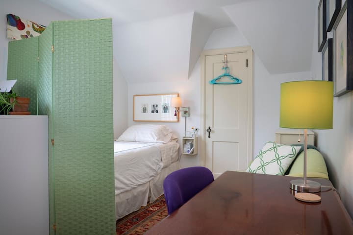Bedroom #3: Single bed with loveseat and desk.
