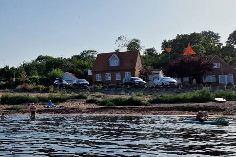 House right by the water with fantastic rock garden