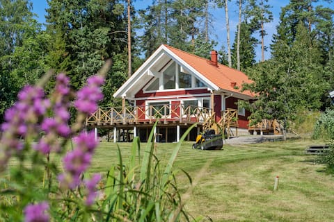 Lovely holiday home by the lake with sauna and fireplace