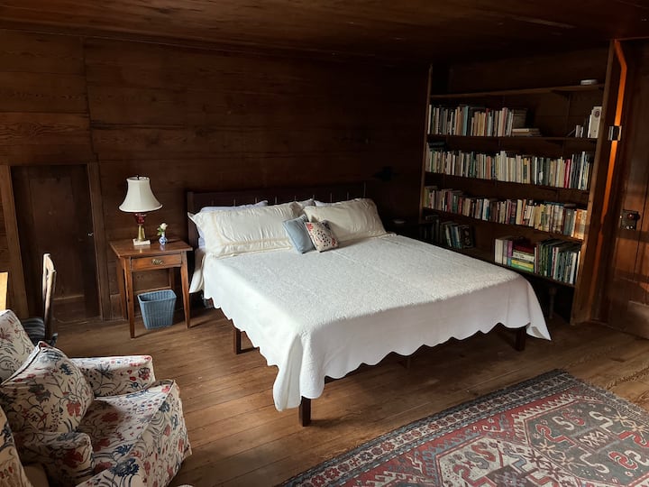 The east bedroom upstairs has its own library of books.