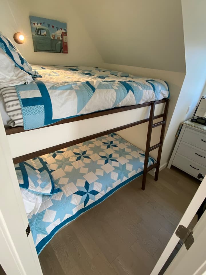 Built in double over double bunk beds are perfect for teens or for mom and dad to cozy up with a little one.  Individually controlled bunk lighting is perfect for story time.