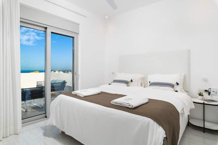 Unwind in the stunning master bedroom on the second floor.