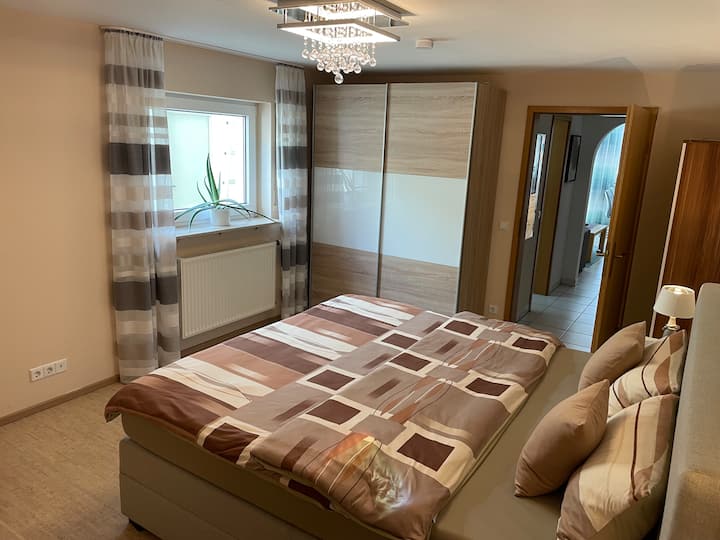 Bedroom with spacious sliding door cabinet