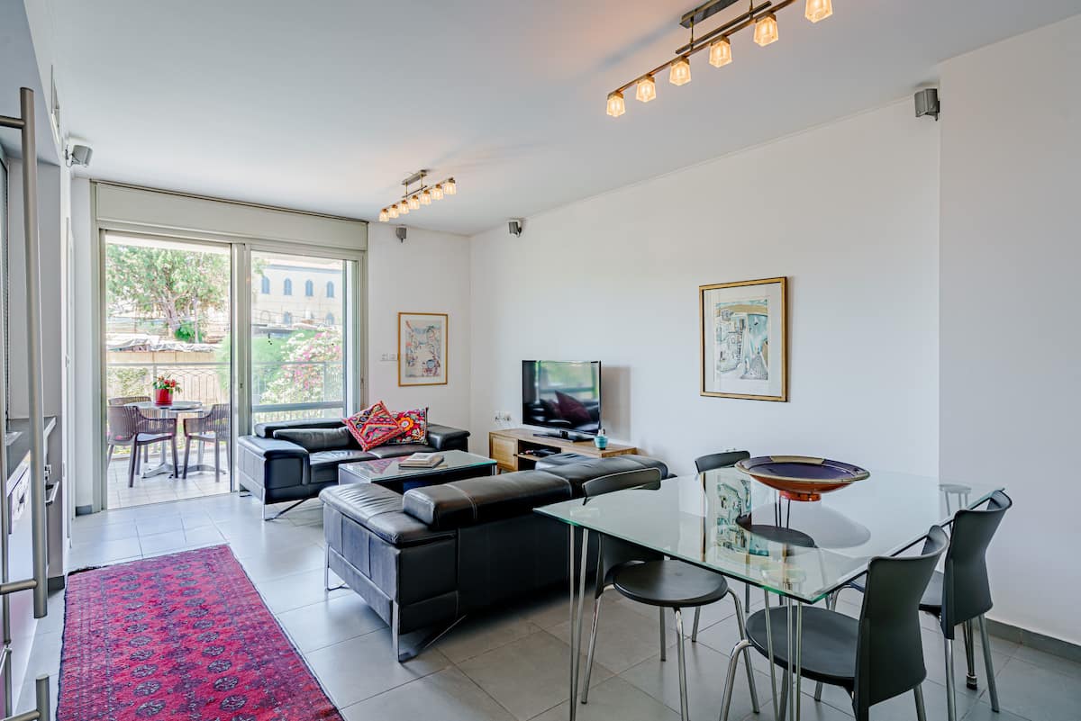 Harova Apartment living room with balcony view