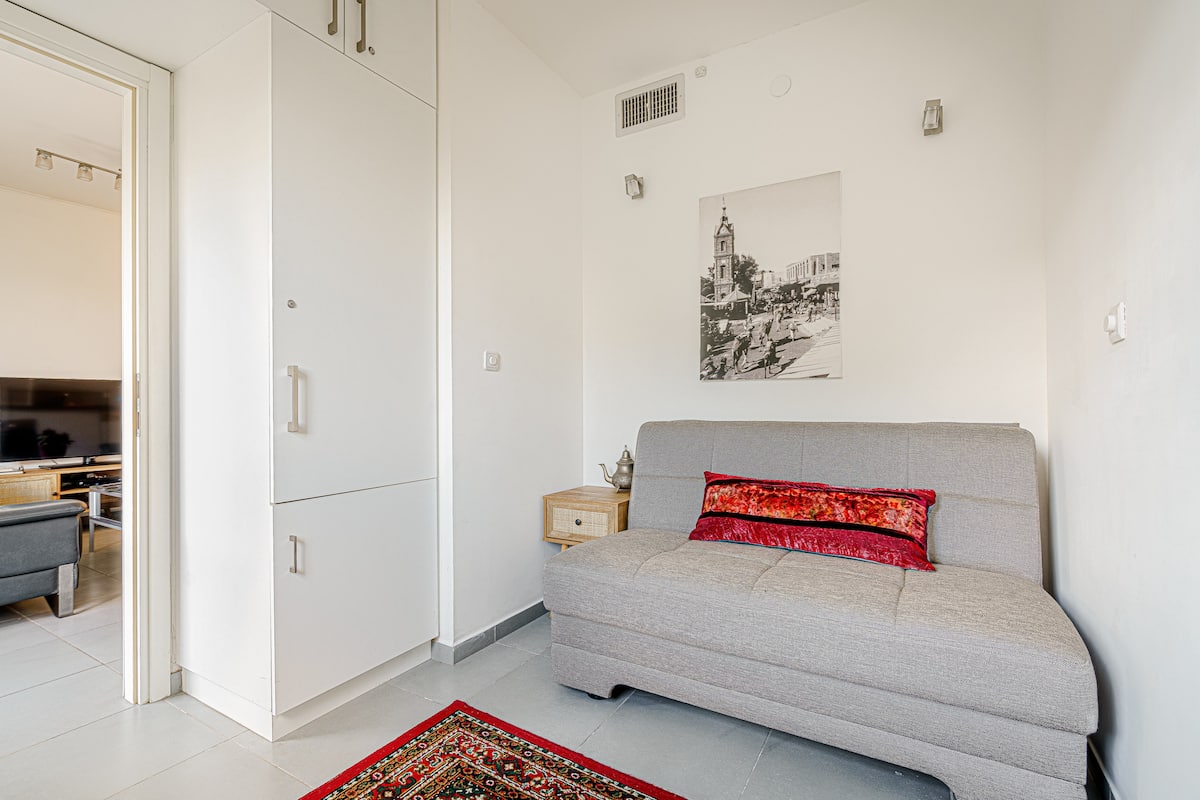 Living area with dining table and balcony doors