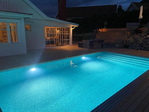 Villa in summer idyll near the sea with pool and sauna