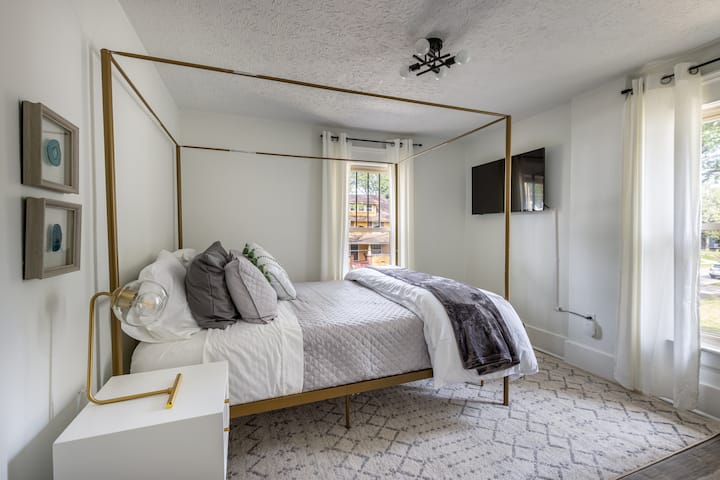 All three bedrooms are located upstairs. BEDROOM #2: This bedroom has a Queen size bed, luggage rack, bench at end of bed, night stand, plugs to charge your electronics, optional room fan inside the closet,  and Smart TV.