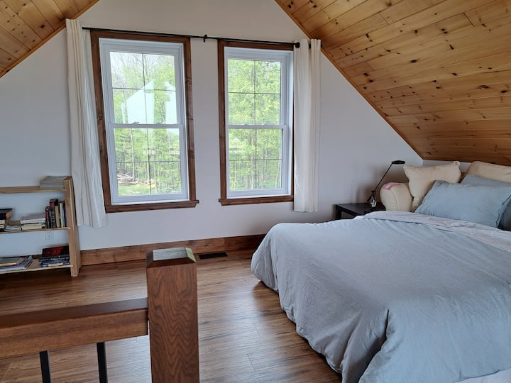 The bright spacious loft turned into a second bedroom. 