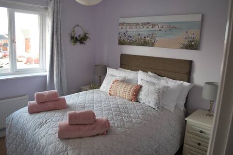 Welcoming, bright, two bedroom seaside house.