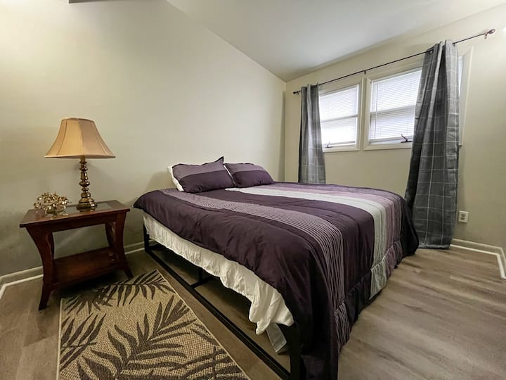 King size comfortable bed awaits you after a long day of travel, tailgating or something else all together.