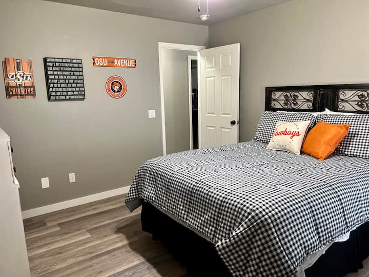 2nd Bedroom w/ queen bed, TV with FireStick, & spacious closet.