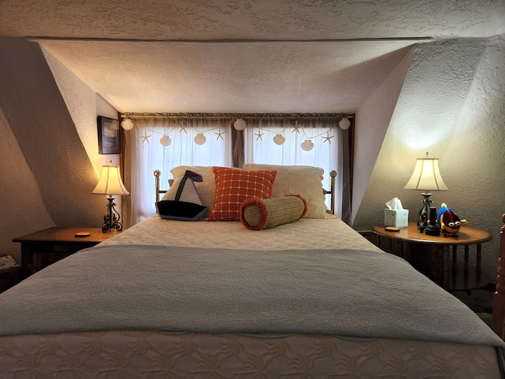 Queen bed in loft