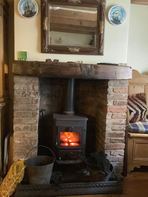 Successful Airbnb property: Warm comfortable cottage,sea view from rear garden in Fylingdales