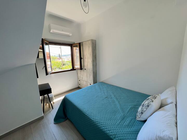 The second bedroom with a nice view, TV, aircondition with cooling/heating function and a closet.