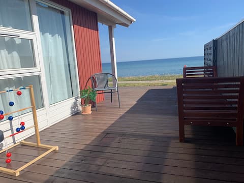 Cozy house in the first row to a beautiful beach.