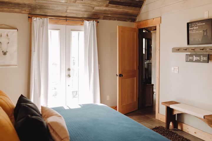 This downstairs master suite opens up to your own private courtyard paradise. Settle into a comfortable patio chair with a cup of hot tea as the morning rays awaken your soul.