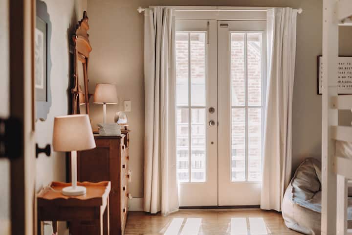 Snuggle up & settle into a quiet evening with book time at the end of a long day. Or pull out provided toys for hours of quiet fun. In this room, we provide Legos, Lincoln Logs, Callico Critters, hero action figures, & other loose parts play toys. 