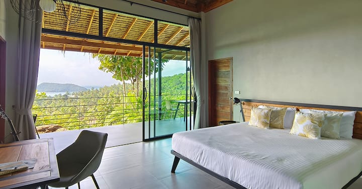 The bedroom with sea views. 