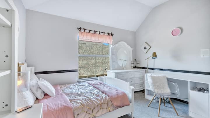 bedroom 3 with vanity and private desk