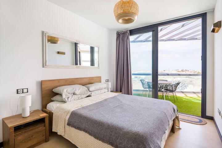 Master bedroom with access to the balcony