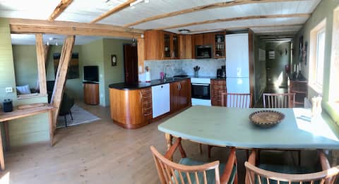 Successful Airbnb property: Unique courtyard apartment with large balcony and lake view in Båstad