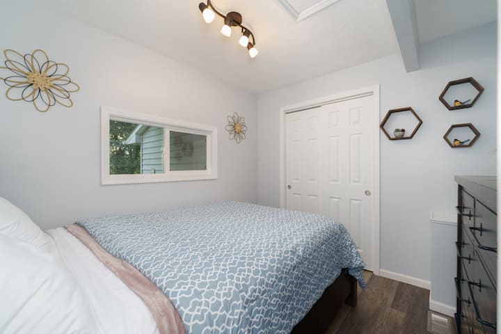 Newly furnished Queen mattress topper bed
