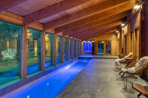 Chalet with Pool, hot tub, sauna and game barn!