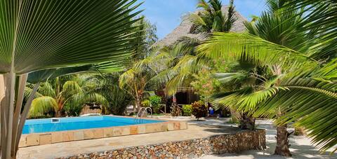 Hidden Beach Oasis: Private Beachfront Villa