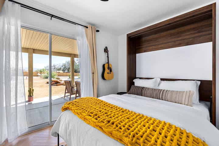 Bedroom 3: Queen Murphy Bed, Record player with instruments and work space with Apple monitor and printer