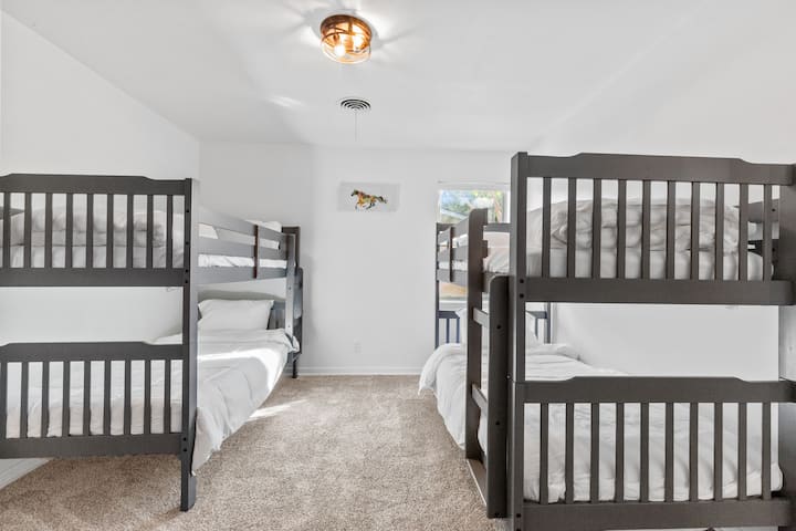 The bunkroom features four twin beds and memory foam mattresses and is great for our younger guests.  Children's toys provided in the closet.