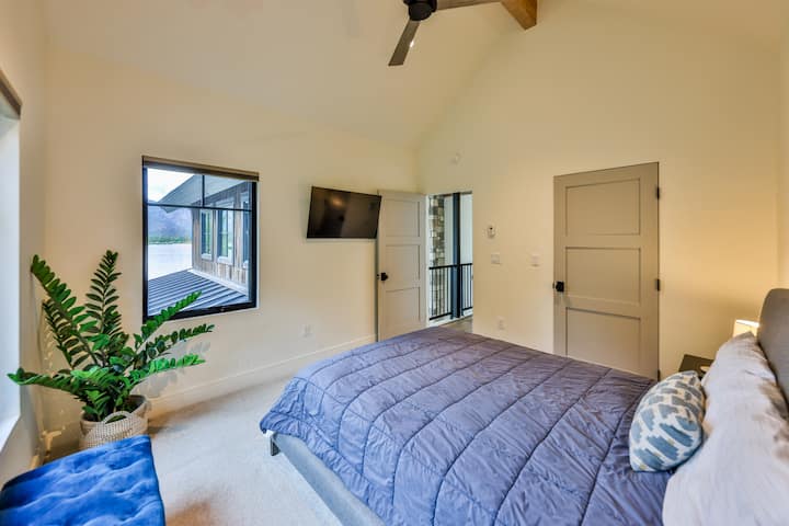 Upper level bedroom with a queen bed.