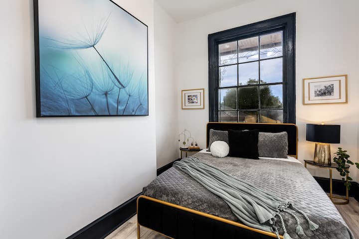 A modern twist on this classic French Quarter apartment 2bd bedroom