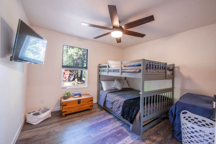 This double bunk bed in the small house is great for bigger kids or two couples. 