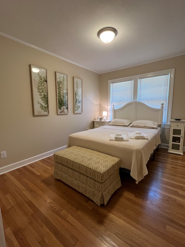 Sweet bedroom with Queen size bed, nightstand, and small closet.