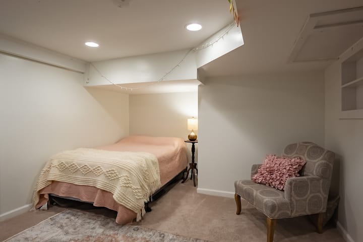 Downstairs room w/ sleeping area - double size bed