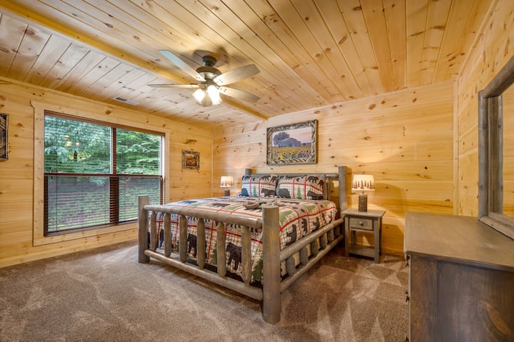 The second bedroom is located upstairs in the front of the cabin.  Features a king-size bed and 43" Smart TV. 