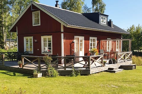 Cheerful cottage with fireplace and large balcony