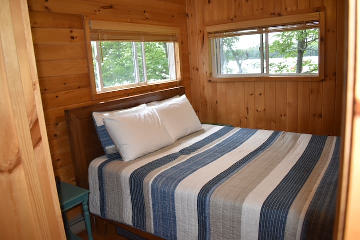 Queen bed - can see lake out both windows.  Dresser, closet, clock, full length mirror