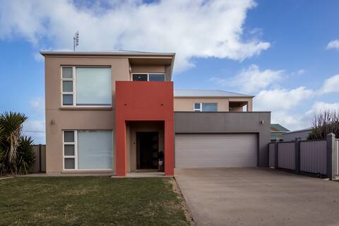 Spacious two story by the sea