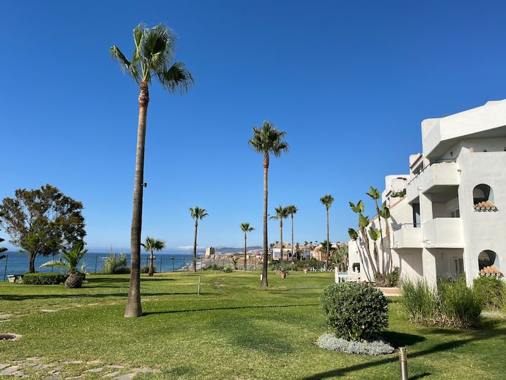 Beachfront condo with pools