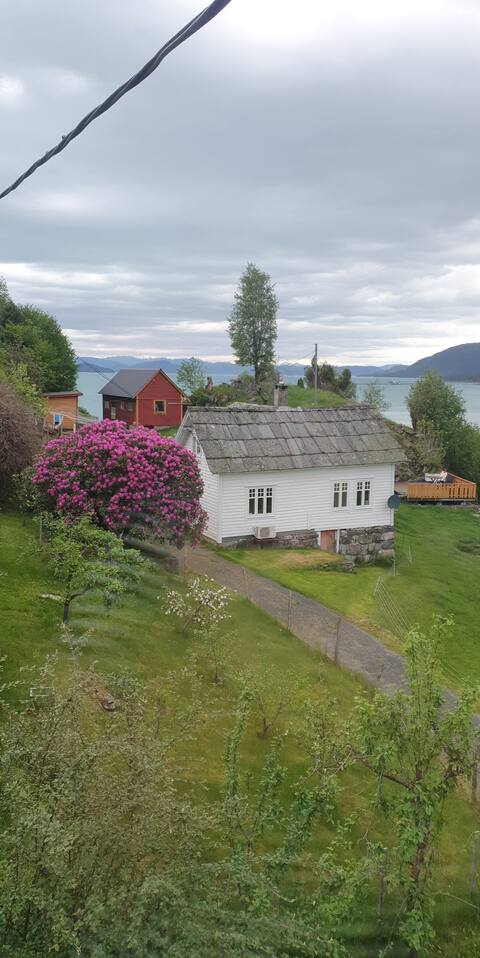 Charming older house in rural surroundings.