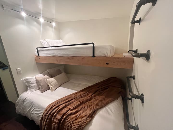 Sleeping loft. Queen on bottom and twin on top