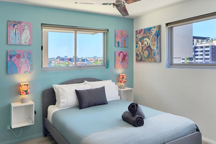 Both bedrooms have ensuitesm this first bedroom has 180 degree views of the city.