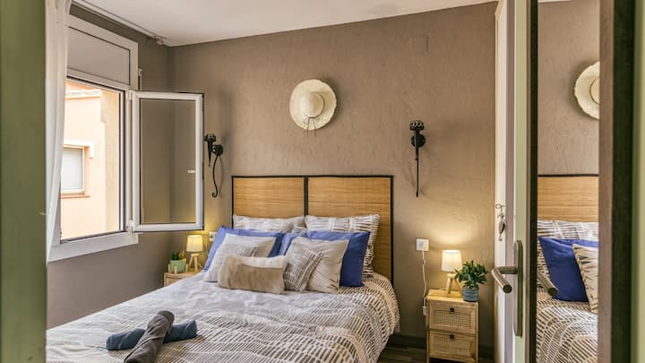 Bedroom 1 
Air-conditioned The room is ideal for relaxing after a day of exploring. Enjoy the natural light, and imagine yourself lounging with a book with the sleek and relaxing atmosphere provided by this neat decor.