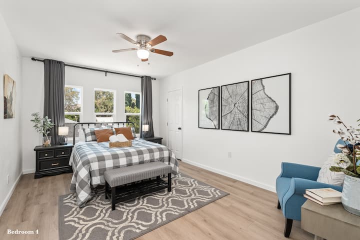 Your upstairs Queen bedroom, a thoughtful sanctuary, complete with nightstands to set aside and charge your smartphone.