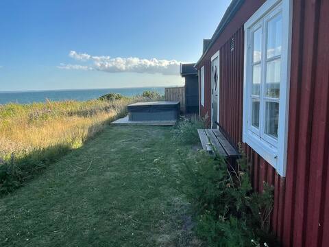 Cozy Oceanfront Village Home with Hot Tub