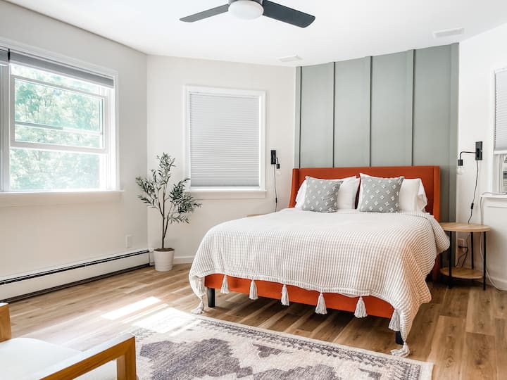 Second floor master bedroom with large closet storage and TV. Mountain Views.