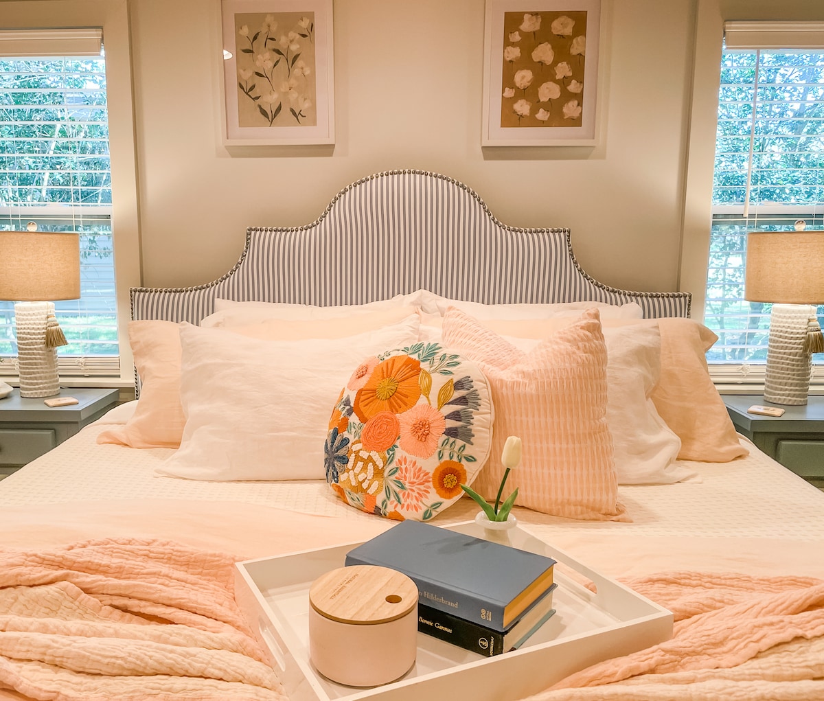 Main floor primary; Upholstered One Kings Lane Hedren Stripe king bed. 