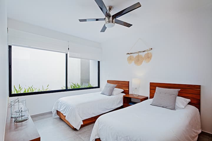All rooms feature ample natural light without the sun ever hitting directly on them